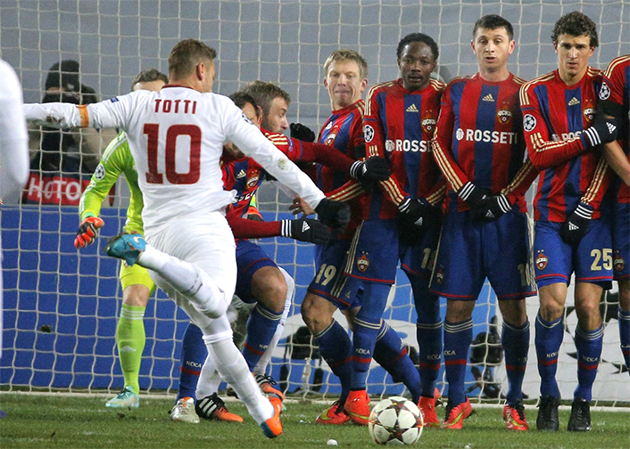 Totti's classy free kick against the fence.